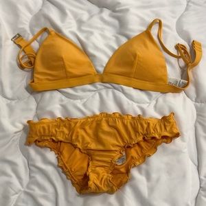 Cute yellow bikini, like new, lightly padded, no wire top, great condition!